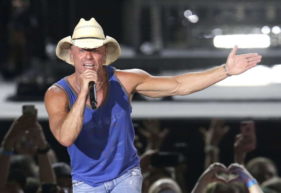 FILE - In this June 23, 2018 file photo, Kenny Chesney performs during the Trip Around the Sun Tour in Phoenix. Chesney’s No Shoes Reefs organization is helping to have an artificial reef installed off of Florida’s Atlantic Coast. The organization and other marine groups donated and installed 13 reef balls on the ocean floor off of Delray Beach in Palm Beach County.  (Photo by Rick Scuteri/Invision/AP, File) Photo: Rick Scuteri, Rick Scuteri/Invision/AP / 2018 Invision
