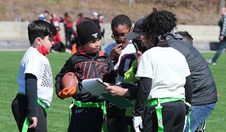 9/11 Youth Flag Football action in Bloomingdale Park