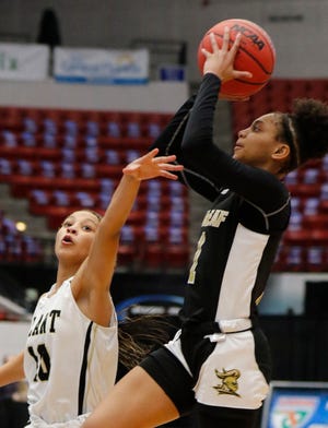 Oakleaf guard Taliah Scott (1) elevates to shoot against Tampa Plant during the FHSAA Class 7A girls basketball state semifinal.