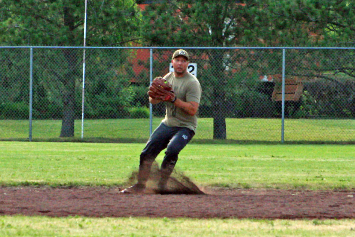 A Cubs player looks to turn two during the final of a fundraising softball tournament. The Cubs would lose the final 12-4. (Cassidy Dankochik Photo - Quesnel Cariboo Observer)