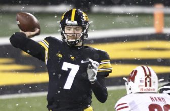 IOWA CITY, IOWA - DECEMBER 12:  Quarterback Spencer Petras #7 of the Iowa Hawkeyes throws a pass during the second half against the Wisconsin Badgers at Kinnick Stadium on December 12, 2020 in Iowa City, Iowa.  (Photo by Matthew Holst/Getty Images)