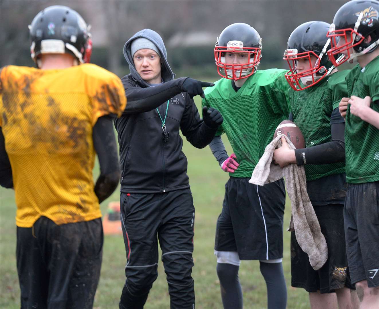 Highland Wildcats hold a Highland Academy Community League event on Saturday encouraging more youngsters to play Amercian Football.Coach Robbie Paulin gives out the plays.Picture: Gary Anthony. Image No.040052