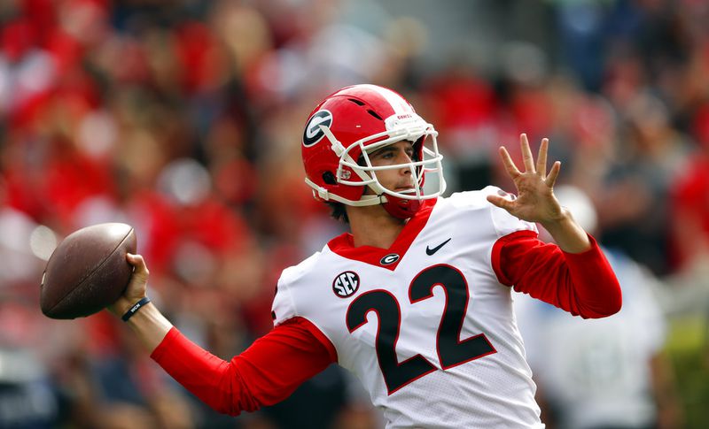 Walk-on quarterback Stetson Bennett (22) throws a pass during during the first half of Georgia's annual G Day inter squad spring football game Saturday, April 21, 2018, in Athens, Ga. (AP Photo/John Bazemore)