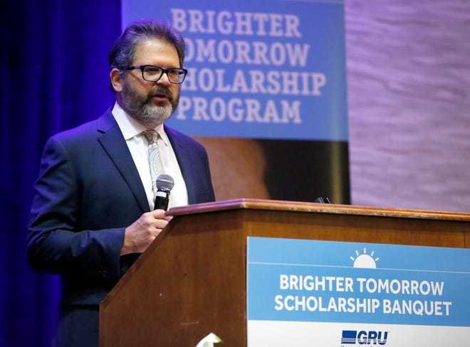 Ed Bielarski, the general manager of Gainesville Regional Utilities, delivers remarks during the GRU Brighter Tomorrow Scholarship Banquet at the UF Hilton, in Gainesville May 9, 2019. GRU was able to give out several scholarships to high school students in the Gainesville area.    [Brad McClenny/The Gainesville Sun]