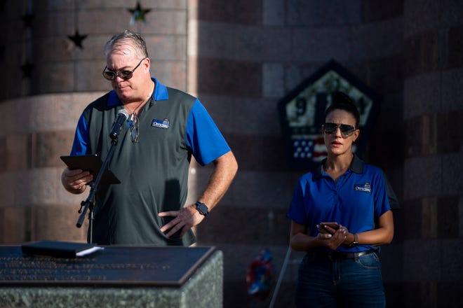 Michael Randall, left, and Rosemary Zore, right, shown here at a  September 11, 2020, memorial  at Freedom Park in Naples organized by the organization they run, The Fallen Officers. Randall and Zore were arrested Tuesday on felony charges related to soliciting for contributions.
