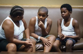 (Left to right) Linwood Bowser, Zakhai McCleary, and Jahzear Gredic, spend time together during a retreat organized by Moms Bonded By Grief, attended by Philadelphia children and their families who have been impacted by gun violence, at the Kalahari Resorts Waterpark, in the Poconos, August 27, 2021.