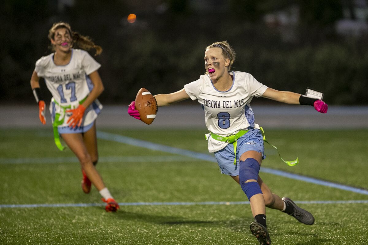 Corona del Mar's Alex Boserup celebrates after scoring a touchdown against Newport Harbor during Wednesday night's game.