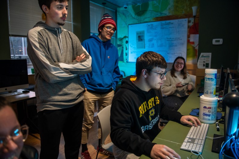 From left, Point Park University students Mason Strawn, Jake Dabkowski, and Antonio Rossetti work in the Point Park Globe student-run newsroom, Monday, Nov. 14, 2022, at the school’s in downtown Pittsburgh campus. (Photo by Stephanie Strasburg/PublicSource)
#redzone
