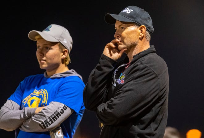 Jory Kirchhevel, a PE teacher at Dr. Carreon Academy in Indio, watches his team play during the DSUSD Elementary Flag Football League Championships at Colonel Mitchell Paige Middle School in La Quinta, Calif., Friday, Dec. 9, 2022. 