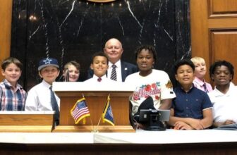 Lawmaker honors youth flag football team |