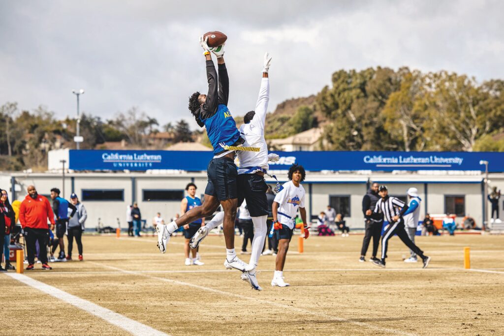 OVER THE TOP—Above, Kory Hall, a junior wide receiver/safety for Cleveland High of Reseda, leaps to make a catch during the Los Angeles Rams’ high school flag football tournament on March 5 at Cal Lutheran. Hall and 95 California prep football players participated in the extravaganza. Hall is a three-sport athlete in football, basketball and track and field. He has Division I football scholarship offers from Washington State and Colorado State. Photos courtesy of Los Angeles Rams