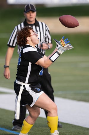 Leominster's Kay'Don Austin catches the first touchdown versus Fitchburg in the inaugural flag football game Thursday sponsored by the New England Patriots at Doyle Field in Leominster.