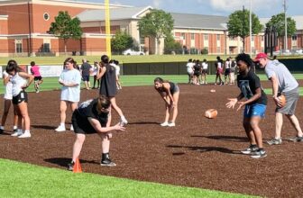 Potential players are pictured Tuesday at tryouts for Gadsden City High School's first girls' flag football team.