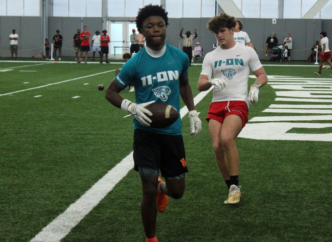 Hawthorne scores a touchdown against Creekside during the Jaguars Prep 11-On football tournament inside the indoor flex field.