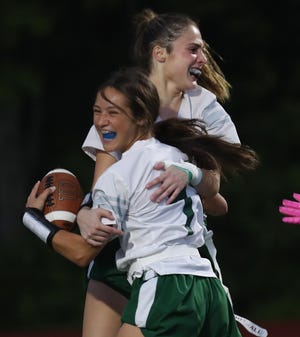 Lakeland's Samantha Del Ponte (7) celebrates with teammate Samantha Moscati (16)  after she scored the only touchdown of the game against Brewster in the flag football large school Section 1 championship at Mahopac High School May 24, 2023. Lakeland won the game 6-0.