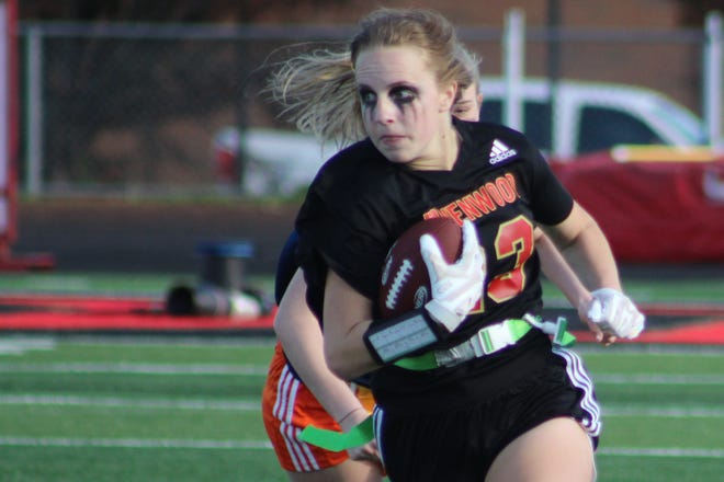Ravenwood running back Laurie Crawford runs upfield during the Lady Raptors' 20-6 win over Summit.
