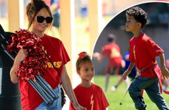 Chrissy Teigen cheers on her adorable son Miles at his football tournament in Los Angeles alongside her mini-me daughter Luna