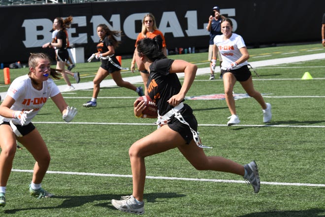 This player breaks away on a first down run at the girls flag football kickoff jamboree sponsored by USA Flag Football and the Cincinnati Bengals at Paycor Stadium, Sept. 30, 2023.