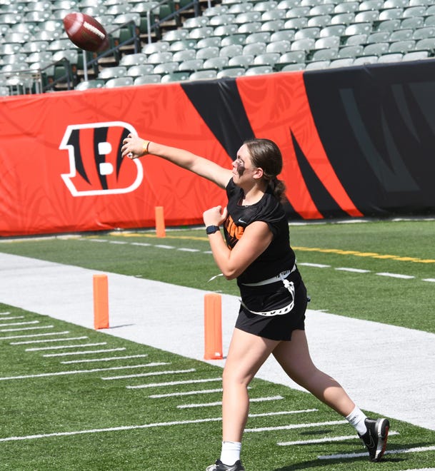 This quarterback gets off a pass at the girls flag football kickoff jamboree sponsored by USA Flag Football and the Cincinnati Bengals at Paycor Stadium, Sept. 30, 2023.