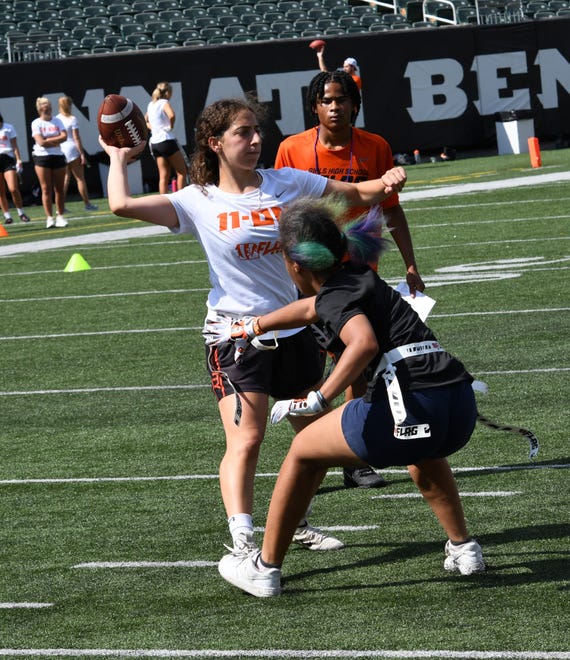 This player looks to complete a pass at the girls flag football kickoff jamboree sponsored by USA Flag Football and the Cincinnati Bengals at Paycor Stadium, Sept. 30, 2023.