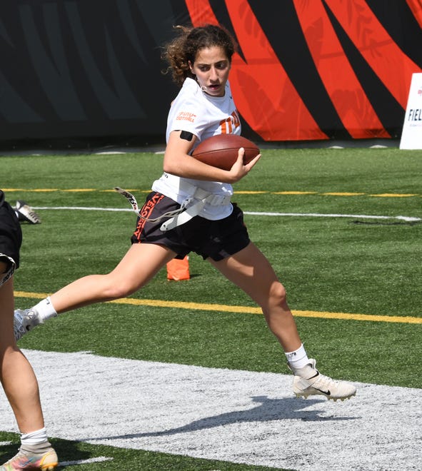 This player makes a solid interception return at the girls flag football kickoff jamboree sponsored by USA Flag Football and the Cincinnati Bengals at Paycor Stadium, Sept. 30, 2023.