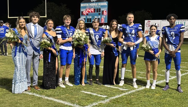 Destin High's first-ever homecoming court poses for a few photos during halftime of Friday nights game. Destin beat Jay 22-6 for a homecoming victory.