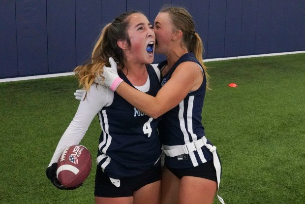 Ralston Valley High School's Gianna Tate(4) and Jill Bundgaard (5) celebrate after scoring against Cherry Creek High School at Centura Health Training Center on Saturday, October 14, 2023 in Englewood, Colorado. The Denver Broncos hosted the Broncos Girls High School Flag Football tournament bringing together Denver Public Schools, Cherry Creek Schools and Jeffco Public Schools to compete for the championship title. (Rebecca Slezak/ Special to The Denver Post)