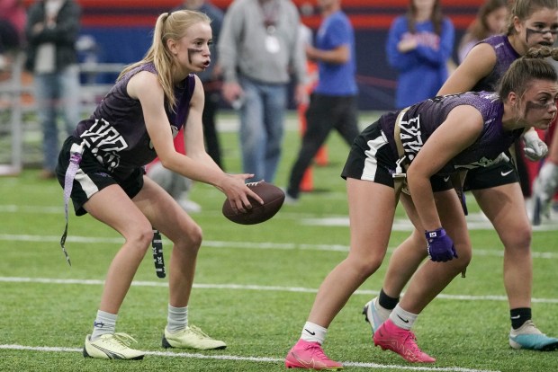 Arvada West High School's quarterback Saylor Swanson (18) holds the ball during the championship game at Centura Health Training Center on Saturday, October 14, 2023 in Englewood, Colorado. The Denver Broncos hosted the Broncos Girls High School Flag Football tournament bringing together Denver Public Schools, Cherry Creek Schools and Jeffco High Schools to compete for the championship title. (Rebecca Slezak/ Special to The Denver Post)
