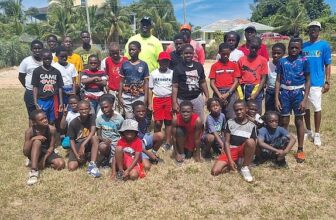 TEAM EFFORT: The Bahamas Youth Flag Football League (BYFFL) partnered with the Barracudas Flag Football Club in Harbour Island to host a youth flag football clinic this past weekend.