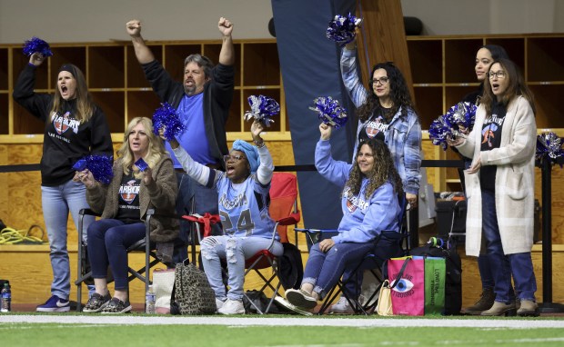 Willowbrook High School parents cheer during the championship game against...