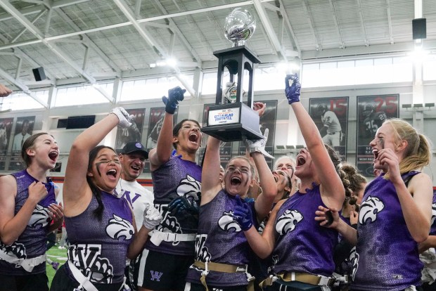 Arvada West High School players celebrate after winning the championship game against Cherry Creek High School at Centura Health Training Center on Saturday, October 14, 2023 in Englewood, Colorado. The Denver Broncos hosted the Broncos Girls High School Flag Football tournament bringing together Denver Public Schools, Cherry Creek Schools and Jeffco Public Schools to compete for the championship title. (Rebecca Slezak/ Special to The Denver Post)